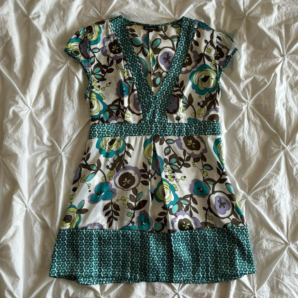 le chateau cap sleeve v neck babydoll dress